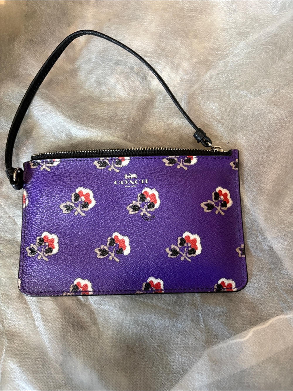 COACH Purple Floral Leather Wristlet with Black Strap